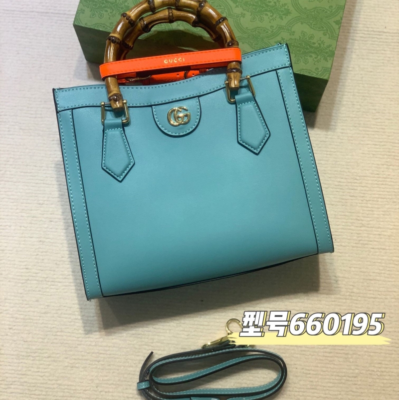 G*u*i top handle bags